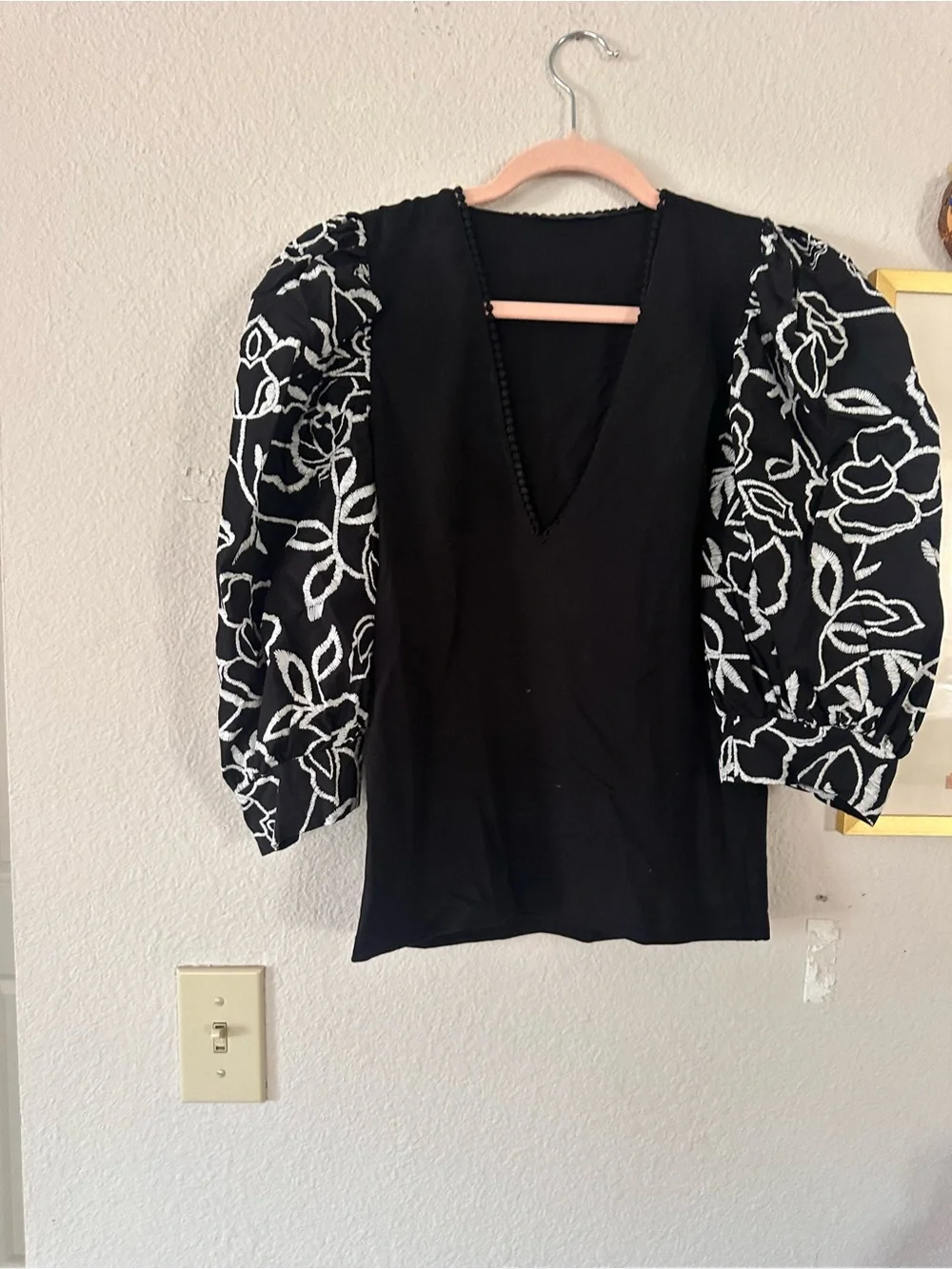 Zara runs small black